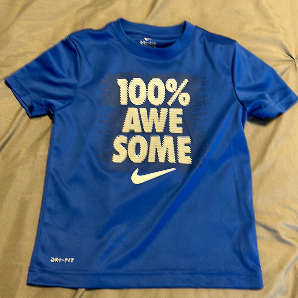 Nike boy size 7 short sleeve shirt.